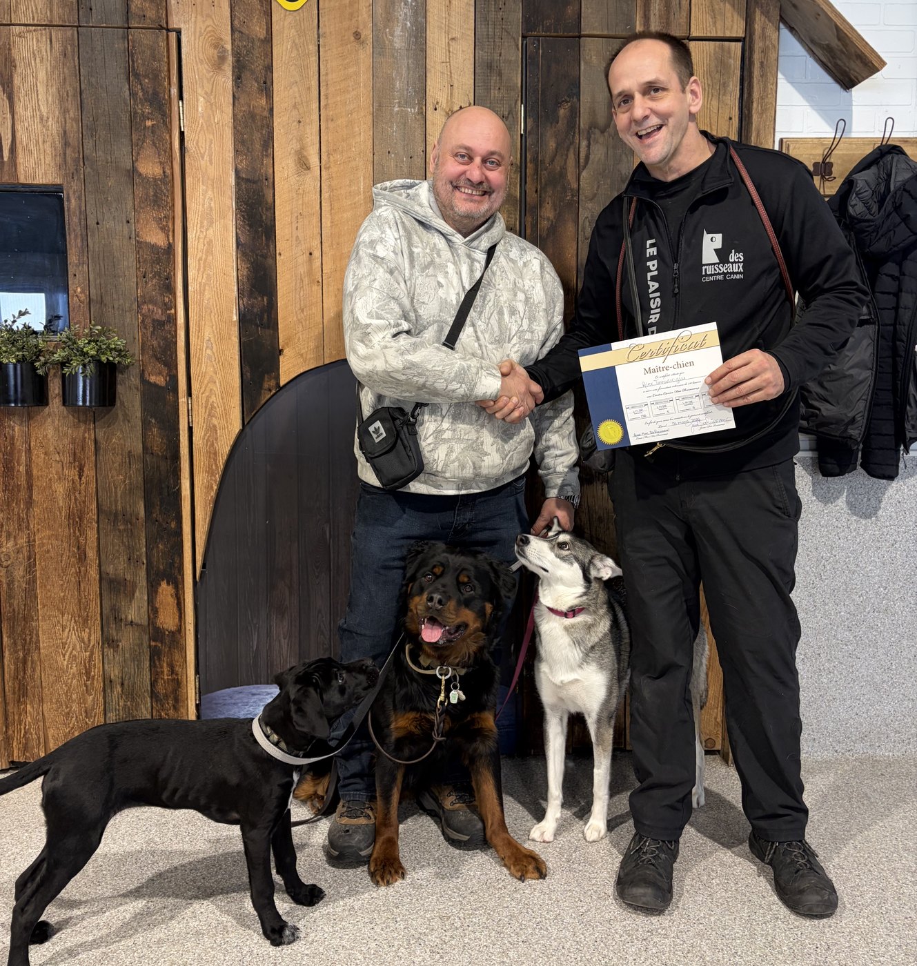 Alex Tinnivlioglu receiving his Maître-chien certificate at Centre Canin des Ruisseaux
